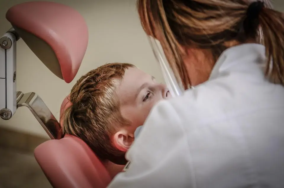 Dentist with patient (stock photo)